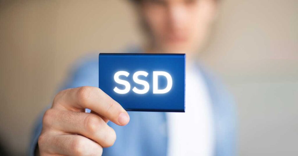 Person holding SSD hard-drive